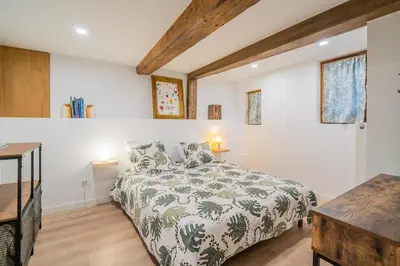 Un ou plusieurs lits dans un hébergement de l'établissement Au Stammtisch - Cozy, rustic and authentic
