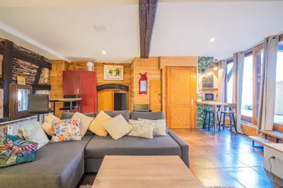 Coin salon dans l'établissement Au Stammtisch - Cozy, rustic and authentic