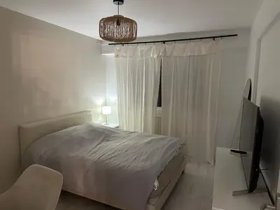 Un ou plusieurs lits dans un hébergement de l'établissement Apartment - Colmar Center - La Roseraie
