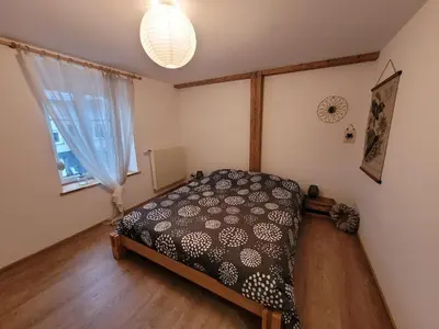 Un ou plusieurs lits dans un hébergement de l'établissement Gîte cosy dans les Vosges