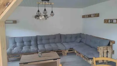 Coin salon dans l'établissement Appartement cosy rénové au calme