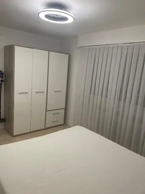 Un ou plusieurs lits dans un hébergement de l'établissement Cozy apartment near Basel Airport