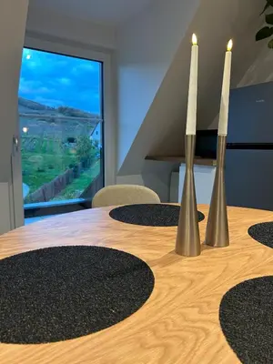 Télévision ou salle de divertissement dans l'établissement Charmant appartement avec vue sur les vignes