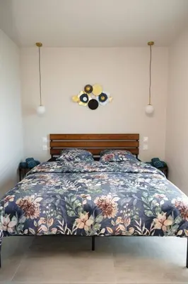 Un ou plusieurs lits dans un hébergement de l'établissement Maison MUGUET 3 SPA-PARKING-COLMAR