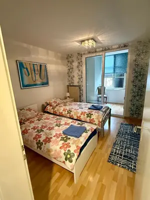 Un ou plusieurs lits dans un hébergement de l'établissement Petit Paradis 74 grand rue