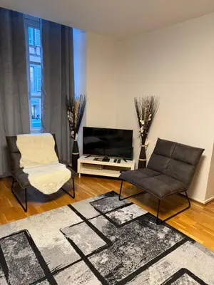 Coin salon dans l'établissement Petit Paradis 74 grand rue
