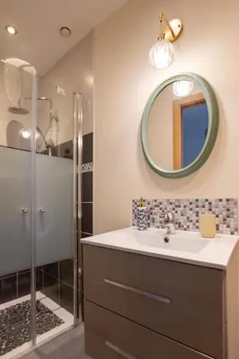 Salle de bains dans l'établissement Le Jardin Secret
