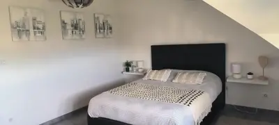 Un ou plusieurs lits dans un hébergement de l'établissement Home sweet home