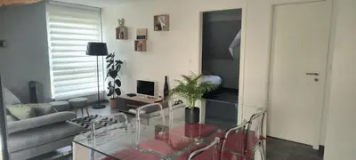 Coin salon dans l'établissement Home sweet home