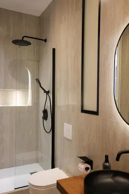 Salle de bains dans l'établissement Résidence du Lion