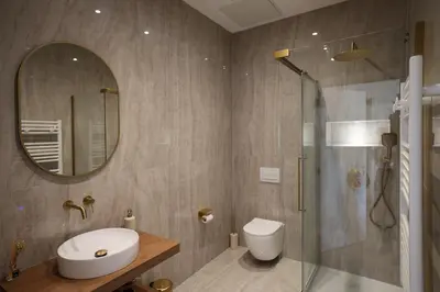 Salle de bains dans l'établissement Résidence du Lion