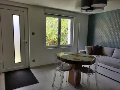 Coin salon dans l'établissement Au bon repos - Escapade idéale au cœur de l'Alsace