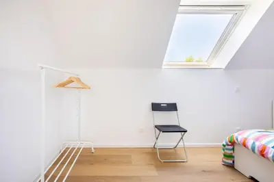 Un ou plusieurs lits dans un hébergement de l'établissement Maison 3 chambres avec terrasse côté champ