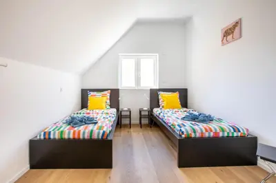 Un ou plusieurs lits dans un hébergement de l'établissement Maison 3 chambres avec terrasse côté champ