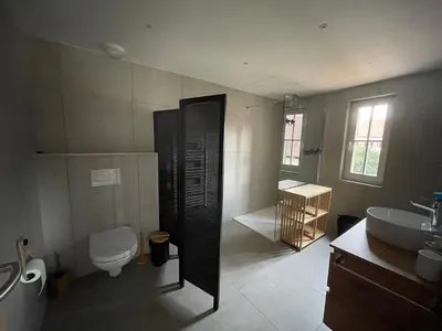 Salle de bains dans l'établissement La cour du vigneron