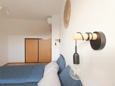 Un ou plusieurs lits dans un hébergement de l'établissement Le balcon suspendu