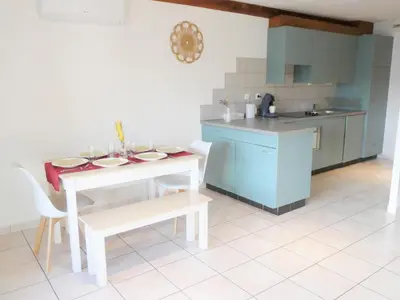 Cuisine ou kitchenette dans l'établissement Le balcon suspendu