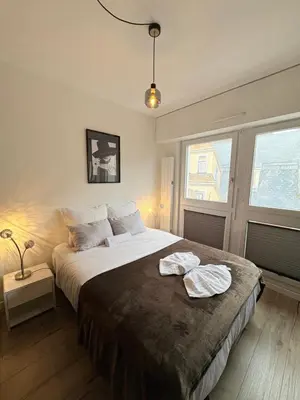 Un ou plusieurs lits dans un hébergement de l'établissement Magnifique logement hyper centre Mulhouse Lambert