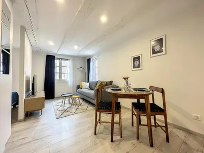 Coin salon dans l'établissement La Grenouillere Chic Appartement Centre Colmar