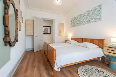 Un ou plusieurs lits dans un hébergement de l'établissement Beautiful Haussmannian apartment in Mulhouse city center