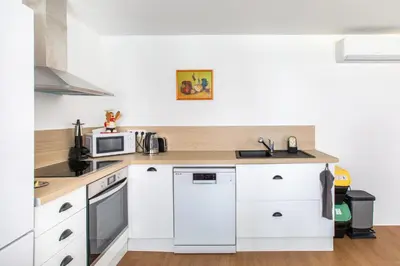 Cuisine ou kitchenette dans l'établissement Gîte chez Suzannala