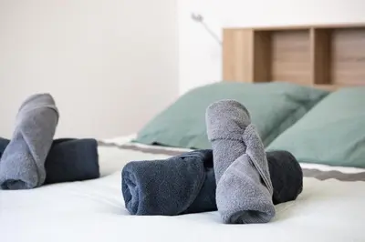 Un ou plusieurs lits dans un hébergement de l'établissement Gîte chez Suzannala