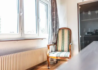Coin salon dans l'établissement Beautiful apartment close to Basel with parking