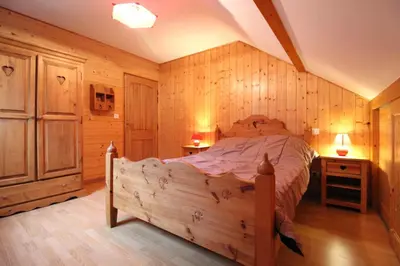 Un ou plusieurs lits dans un hébergement de l'établissement Le Chalet Vert entre nature et animations