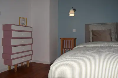 Un ou plusieurs lits dans un hébergement de l'établissement Chez Marguerite & Alphonse 2 pièces proche Colmar