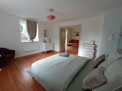 Un ou plusieurs lits dans un hébergement de l'établissement Chez Marguerite & Alphonse 2 pièces proche Colmar