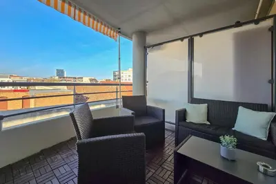 Coin salon dans l'établissement Beautiful apartment 4 people Near Basel WiFi