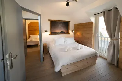 Un ou plusieurs lits dans un hébergement de l'établissement Maison cosy rénovée, cœur de Gérardmer proche lac