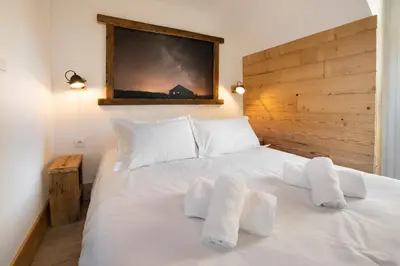Un ou plusieurs lits dans un hébergement de l'établissement Maison cosy rénovée, cœur de Gérardmer proche lac