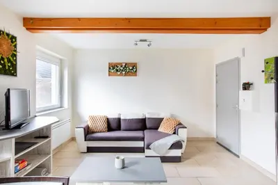 Coin salon dans l'établissement Appartement agréable proche Colmar