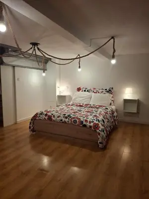 Un ou plusieurs lits dans un hébergement de l'établissement Appartement Floriloft