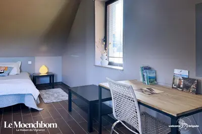 Un ou plusieurs lits dans un hébergement de l'établissement Combo Praelatenberg 2 appartements dans la même maison