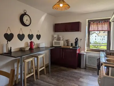 Cuisine ou kitchenette dans l'établissement les piperiens