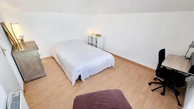 Un ou plusieurs lits dans un hébergement de l'établissement Charmant duplex avec terrasse - Quartier prisé