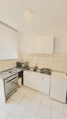 Cuisine ou kitchenette dans l'établissement Charmant duplex avec terrasse - Quartier prisé
