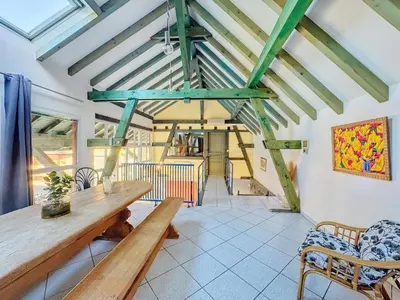 Coin salon dans l'établissement Villa 6 People L'Écurie