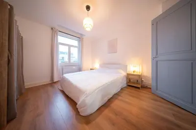 Un ou plusieurs lits dans un hébergement de l'établissement Frontiere Suites 1 Saint-Louis Proche Bale