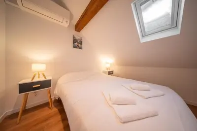 Un ou plusieurs lits dans un hébergement de l'établissement Frontiere Suites 8 Saint-Louis Proche Bale