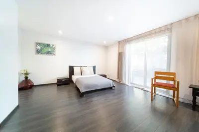 Un ou plusieurs lits dans un hébergement de l'établissement Modern and spacious villa