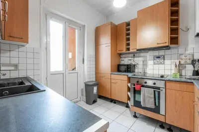 Cuisine ou kitchenette dans l'établissement Very nice apartment Mulhouse Centre near Tram