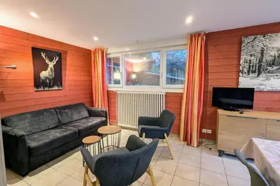 Coin salon dans l'établissement Appartement chaleureux près du lac et des pistes