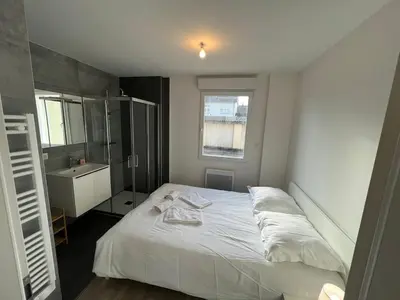 Un ou plusieurs lits dans un hébergement de l'établissement Very nice apartment Huningue - close to Basel