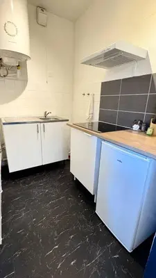 Cuisine ou kitchenette dans l'établissement Cosy 5 - Montbéliard