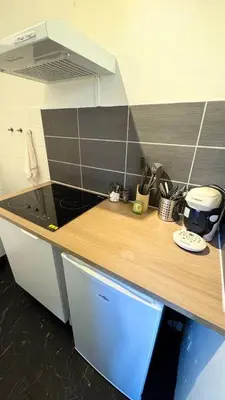 Cuisine ou kitchenette dans l'établissement Cosy 5 - Montbéliard