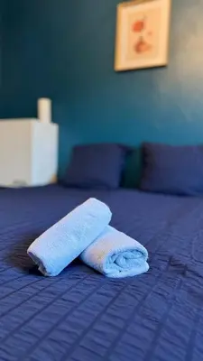 Un ou plusieurs lits dans un hébergement de l'établissement Cosy 5 - Montbéliard