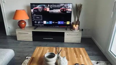 Télévision ou salle de divertissement dans l'établissement Escale et séjour